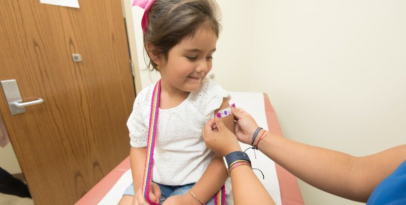 kid getting flu shot